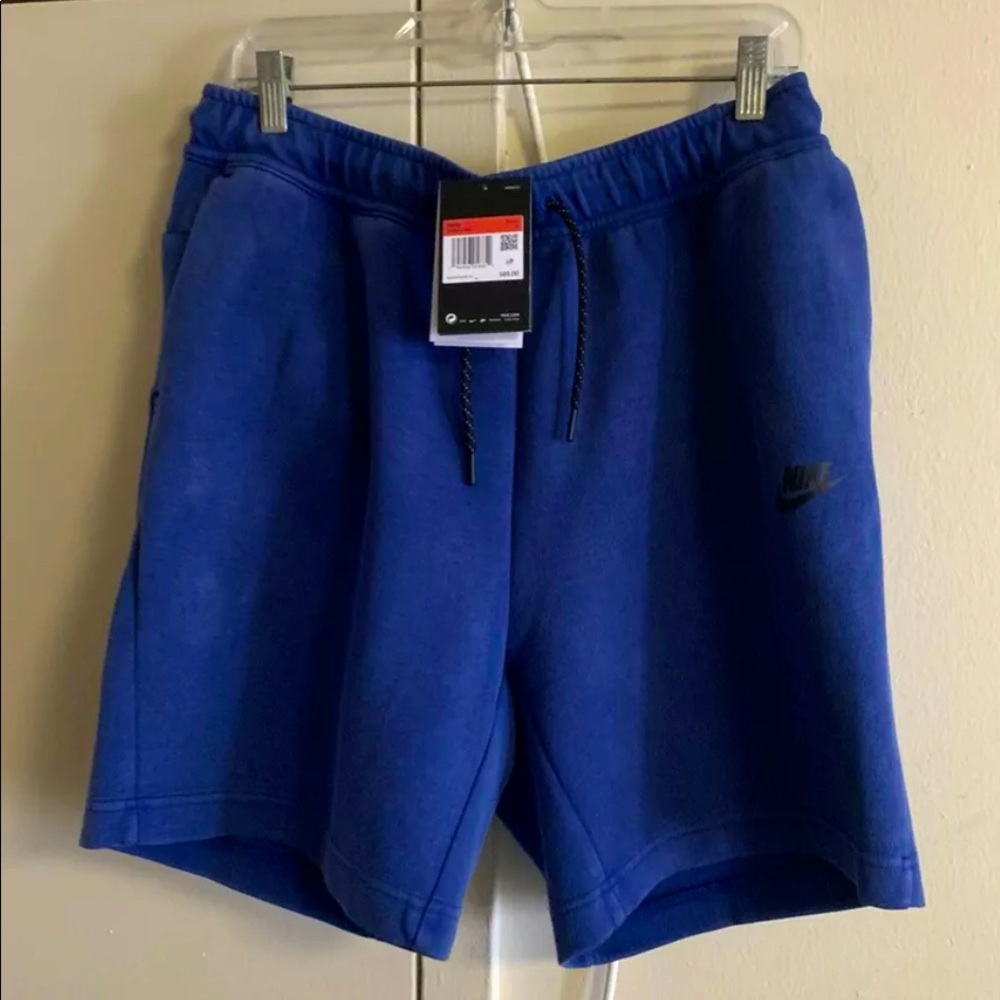 Brand new authentic Nike tech shorts in blue sizes M,L&Xl available